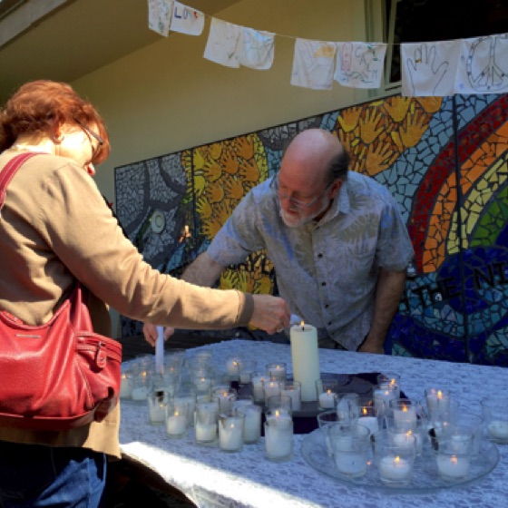 We offered our prayers of love and healing and memory in the form of lighting candles.
